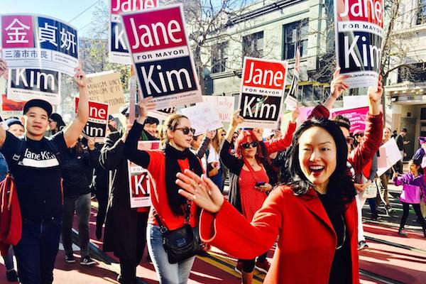 Jane Kim walking with two younger San Franciscans