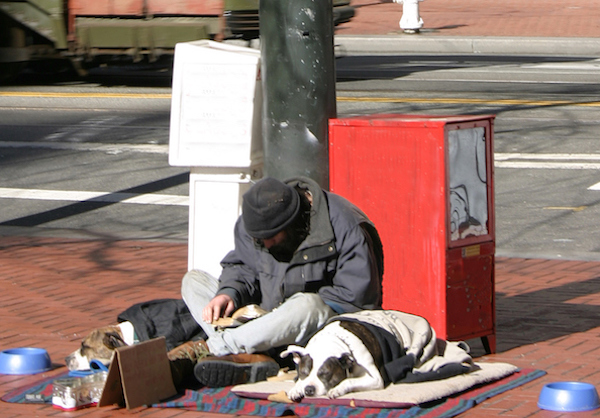 Homeless man and his dog in San Francisco.